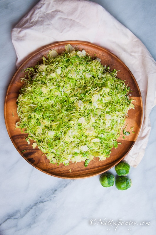 Shaved Brussels Sprouts salad with a Honey-Balsamic Vinaigrette Recipe: Nattyspantry.com