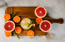Floral Citrus Cocktail with Grapefruit, Orange, Elderflower, and Rosemary Recipe