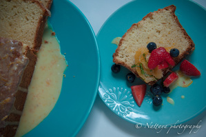 Orange yogurt pound cake with orange citrus-glazed with Spring fruit salad compote.