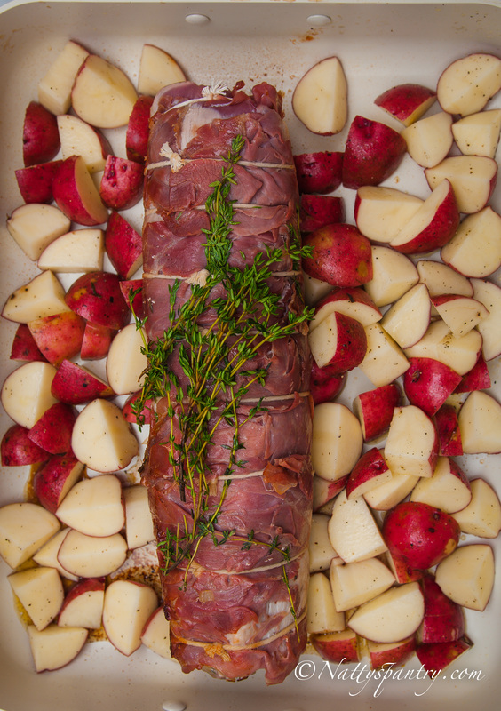Prosciutto Wrapped Pork Loin With Kale And Italian Sausage Stuffing Recipe: Nattyspantry.com